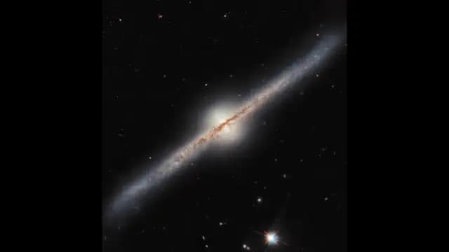 Space Photo of the Week: Hubble's 23-Year Journey to Capture the Tilted Spiral Galaxy