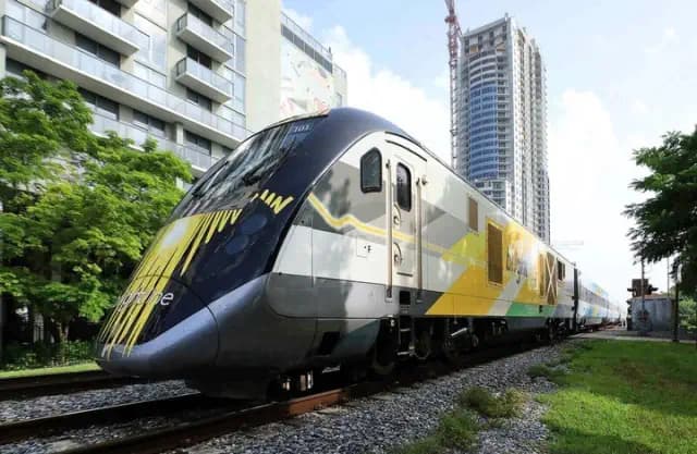 Witness the destruction of this Toyota Prius as it is struck by a train approaching at full speed.