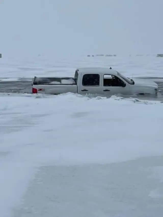 A truck crashes through the ice on Lake Minnewaska.