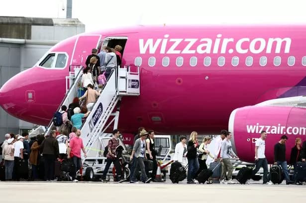 Wizz Air shares sink as it halves profit outlook and reports quarterly loss